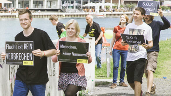 Aktion im Rahmen der Amnesty-Jahresversammlung 2014 in Münster für einen besseren Schutz von Flüchtlingen
